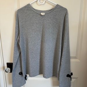 A New Day size large grey top with great details on the sleeve